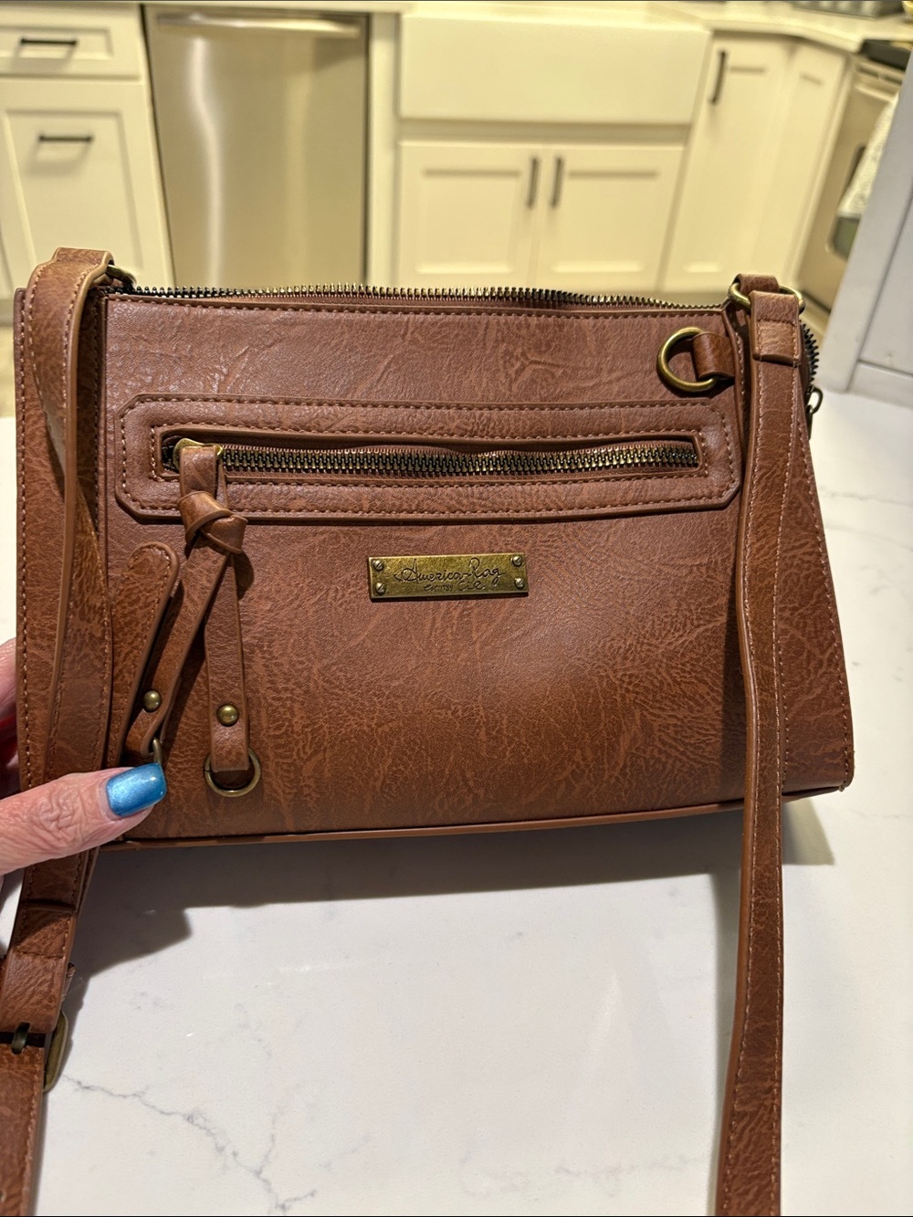 American Rag Brown Crossbody Bag with Front Zip and Tassel